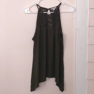 Green sleeveless blouse